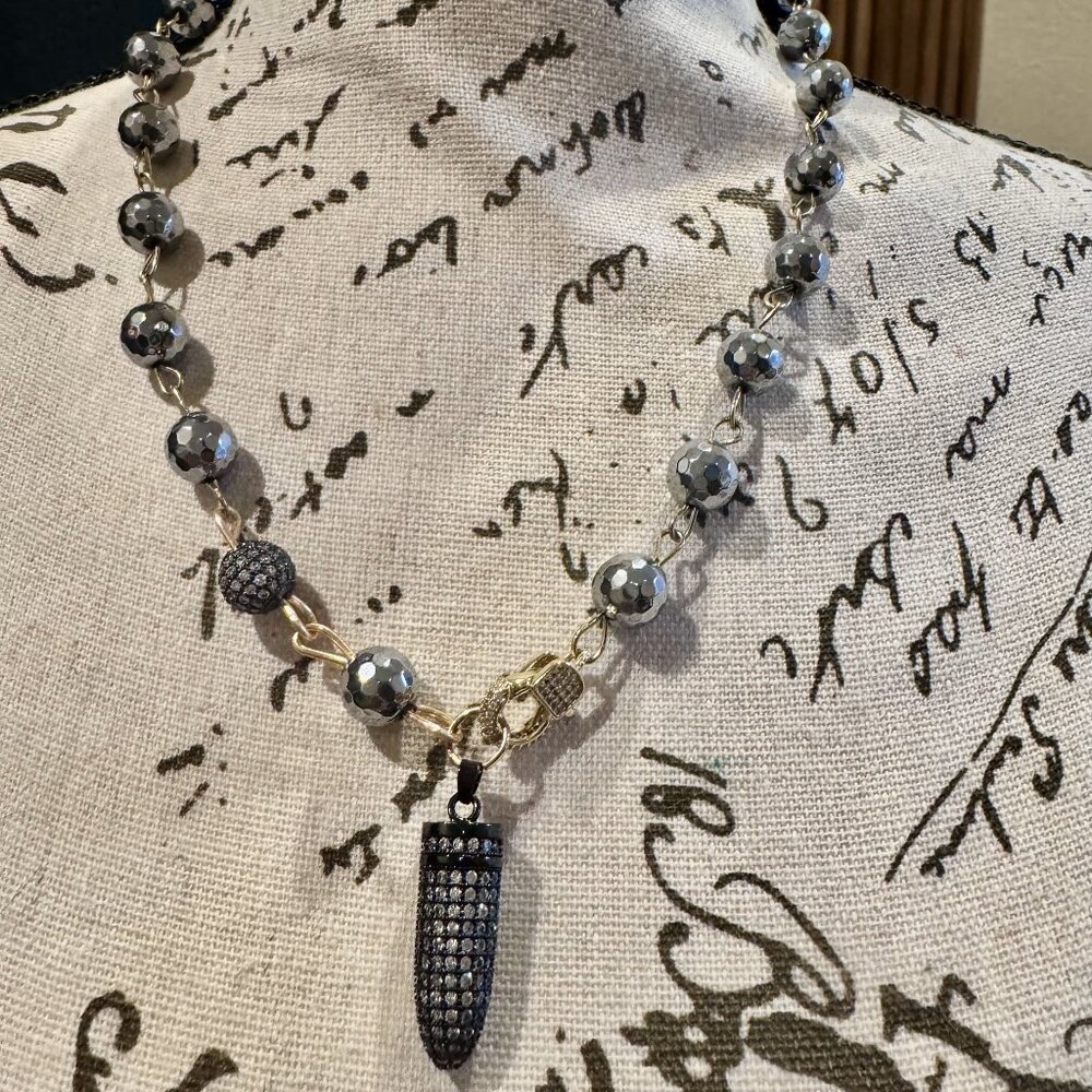 Titanium Plated Hematite Necklace with Rhinestone Bullet Pendent
